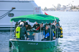 Divers preparing for the Underwater Cleanup. Photo courtesy of Newport Harbor Underwater Cleanup